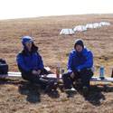 The team eating lunch in the field.
